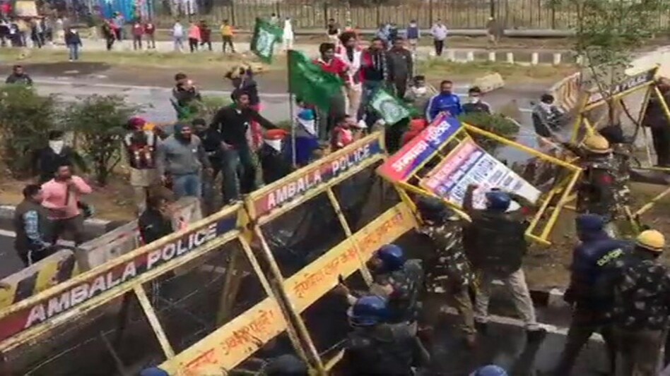 Protesting farmers clash with police on Haryana-Punjab border on Thursday morning as they tried to force their way through barricades to enter Delhi Protesting farmers clash with police on Haryana-Punjab border on Thursday morning as they tried to force their way through barricades to enter Delhi