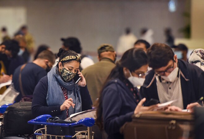 Passengers wait in the arrival area after landing of a flight from United Kingdom at the Chhatrapati Shivaji Maharaj International Airport, in Mumbai (Photo: PTI) Passengers wait in the arrival area after landing of a flight from United Kingdom at the Chhatrapati Shivaji Maharaj International Airport, in Mumbai (Photo: PTI)