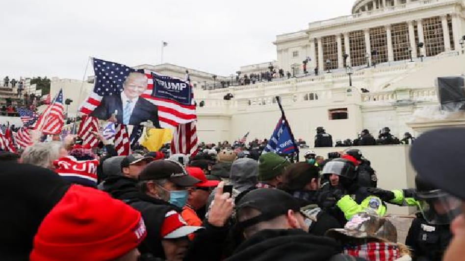 Guns and teargas in U.S. Capitol as Trump supporters attempt to overturn his loss Guns and teargas in U.S. Capitol as Trump supporters attempt to overturn his loss