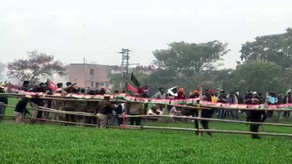 In order to stop the protesting farmers from marching towards Kaimla village, the Haryana police used water cannons and teargas shells (Image: ANI) In order to stop the protesting farmers from marching towards Kaimla village, the Haryana police used water cannons and teargas shells (Image: ANI)