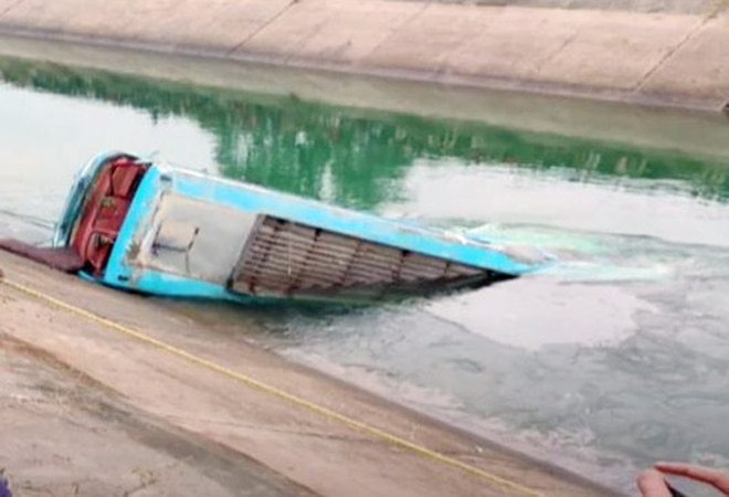A bus, carrying around 54 passengers, fell into a canal in Sidhi after the driver lost control over it. A bus, carrying around 54 passengers, fell into a canal in Sidhi after the driver lost control over it.