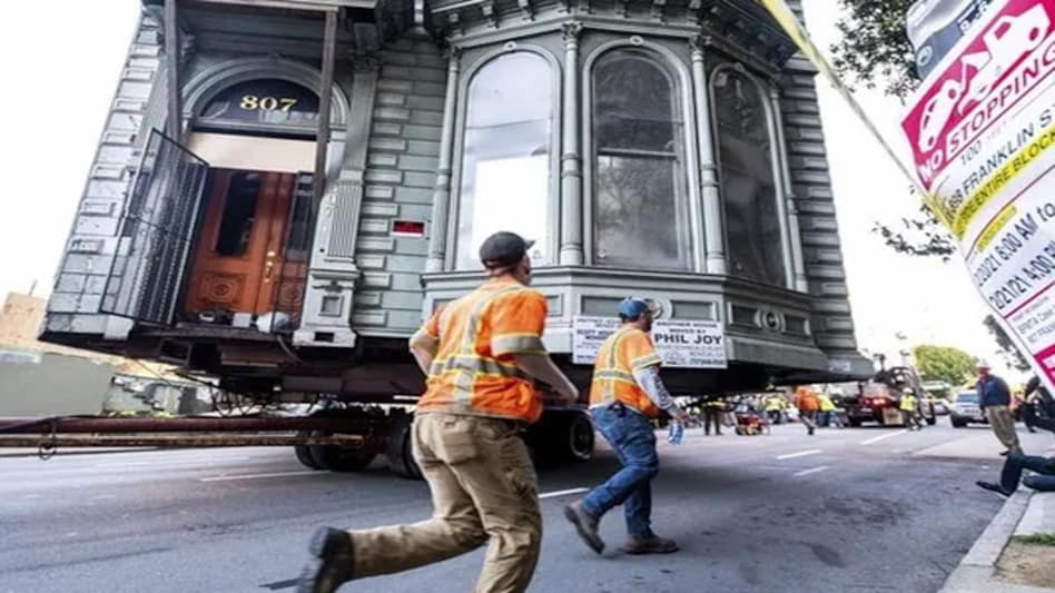 The two-storeyed olive toned house has a brown door and large windows (Photo- AP) The two-storeyed olive toned house has a brown door and large windows (Photo- AP)