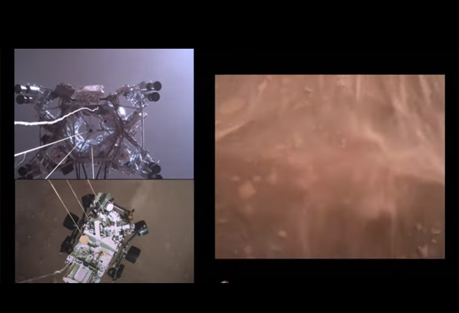 After this, it shows the touchdown of the rover in Jerezo crater in a cloud of dust on Mars (Image: NASA official YouTube channel) After this, it shows the touchdown of the rover in Jerezo crater in a cloud of dust on Mars (Image: NASA official YouTube channel)