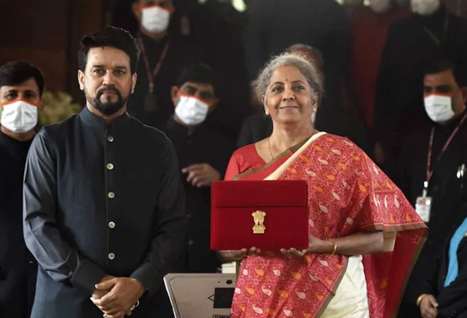 Finance Minister Nirmala Sitharaman with MoS Finance Anurag Thakur. FM Sitharaman presented the Union Budget-2021 in Parliament on Monday. (PTI Photo) Finance Minister Nirmala Sitharaman with MoS Finance Anurag Thakur. FM Sitharaman presented the Union Budget-2021 in Parliament on Monday. (PTI Photo)