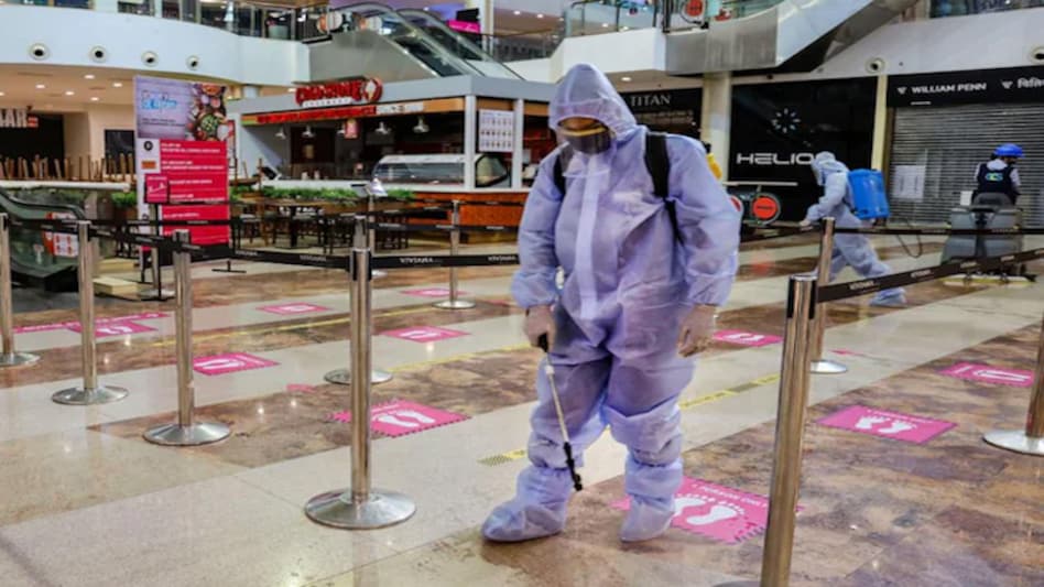 BMC has designated a team for this purpose at the entrance of all the malls in Mumbai BMC has designated a team for this purpose at the entrance of all the malls in Mumbai