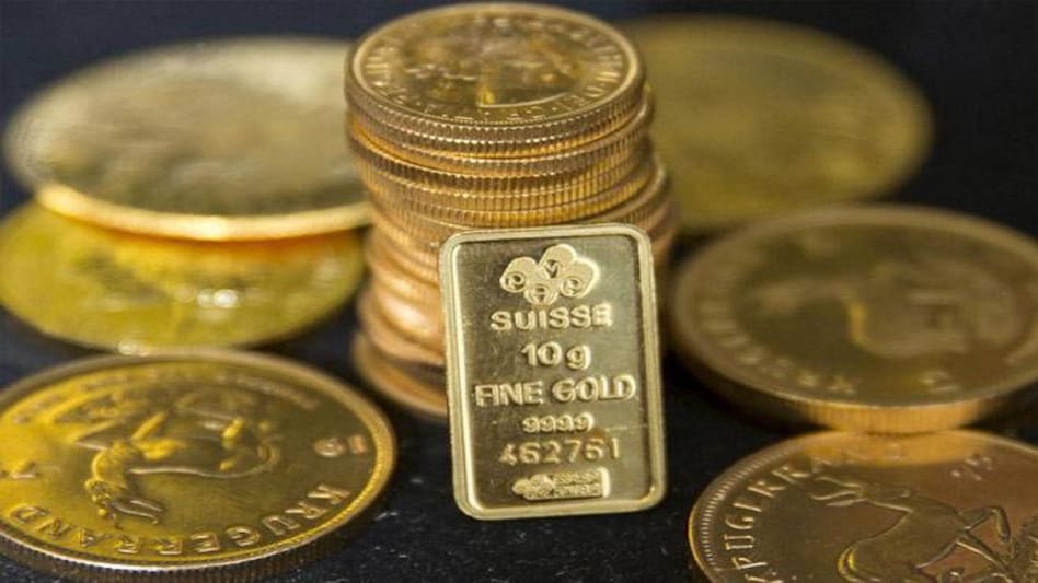 Gold prices fall over stronger dollar, hopes for swift global economic recovery Gold prices fall over stronger dollar, hopes for swift global economic recovery