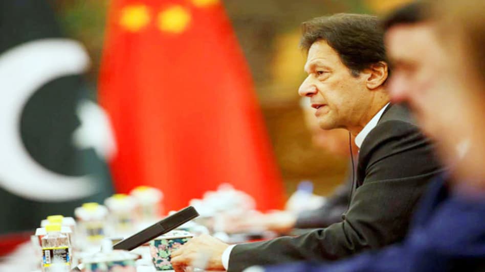 Pakistan's PM Imran Khan is experiencing mild symptoms and will continue working from home Pakistan's PM Imran Khan is experiencing mild symptoms and will continue working from home