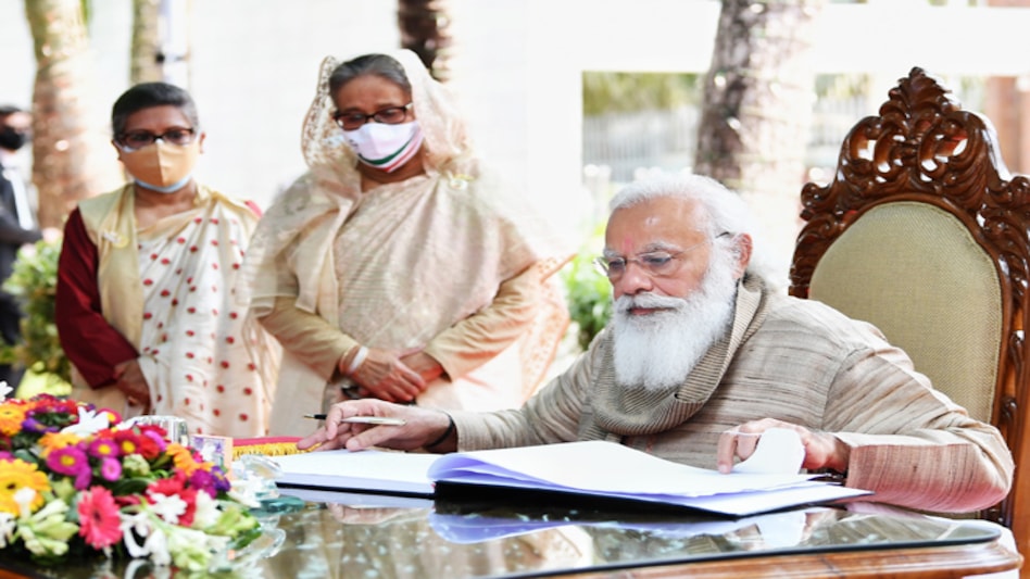 Modi, who visited Bangladesh on his first trip to a foreign country since the COVID-19 outbreak, held extensive talks with Hasina. Both Prime Ministers held a tete-a-tete which was followed by delegation-level talks Modi, who visited Bangladesh on his first trip to a foreign country since the COVID-19 outbreak, held extensive talks with Hasina. Both Prime Ministers held a tete-a-tete which was followed by delegation-level talks