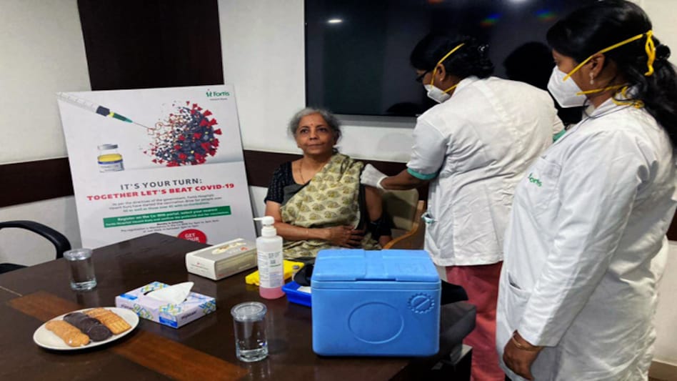 Sister Ramya PC administered the shot to the Union Finance Minister (Image: @nsitharaman/Twitter) Sister Ramya PC administered the shot to the Union Finance Minister (Image: @nsitharaman/Twitter)