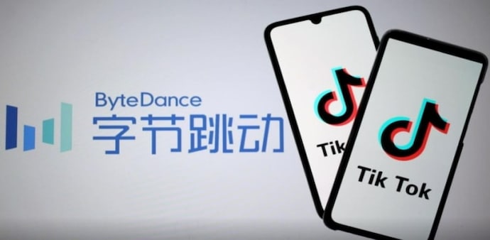 Tik Tok logos are seen on smartphones in front of a displayed ByteDance logo (Image: Reuters) Tik Tok logos are seen on smartphones in front of a displayed ByteDance logo (Image: Reuters)