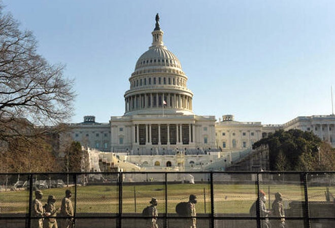 Car rams US Capitol barricade, 2 police officers injured
