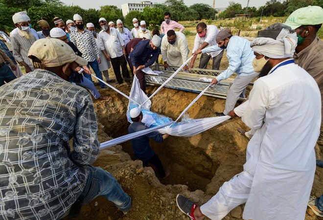 A substantial rise in the fatality rate has led to a rush of bodies at the city's crematoriums and burial grounds A substantial rise in the fatality rate has led to a rush of bodies at the city's crematoriums and burial grounds