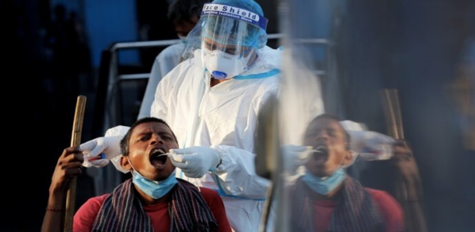 India is reporting over 3 lakh cases daily (Source: Reuters) India is reporting over 3 lakh cases daily (Source: Reuters)