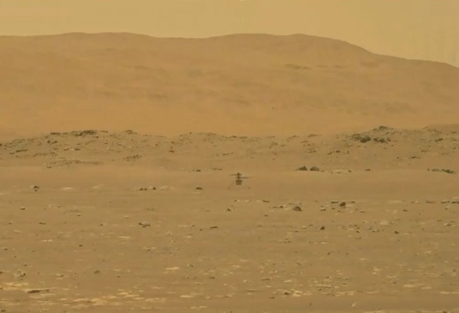 NASA's Mars helicopter Ingenuity is seen during its first flight on the planet in this still image taken from a video on April 19, 2021. (Photo: Reuters) NASA's Mars helicopter Ingenuity is seen during its first flight on the planet in this still image taken from a video on April 19, 2021. (Photo: Reuters)