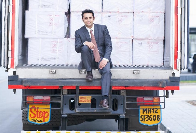 Adar Poonawalla poses with first consignment of Covishield (Photo credit: Twitter) Adar Poonawalla poses with first consignment of Covishield (Photo credit: Twitter)