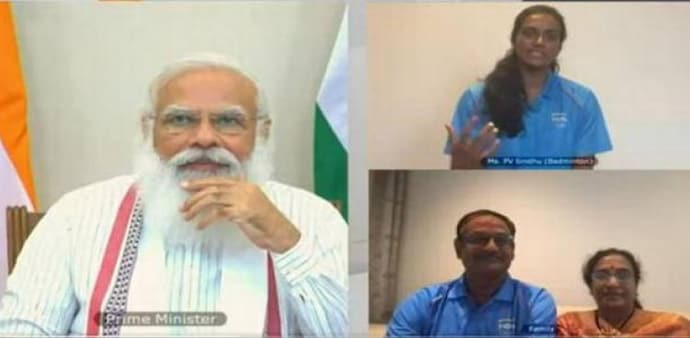 He wished her luck for the Olympics and mentioned that he hopes Sindhu will repeat her success in Tokyo 2020. (Source: ANI) He wished her luck for the Olympics and mentioned that he hopes Sindhu will repeat her success in Tokyo 2020. (Source: ANI)