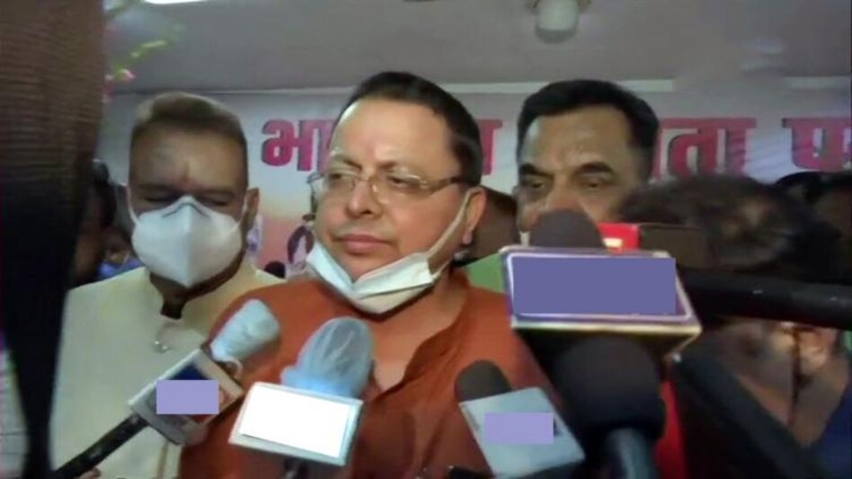 Dhami's election was announced by central observer Narendra Singh Tomar Dhami's election was announced by central observer Narendra Singh Tomar