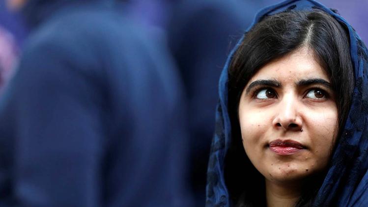 Mirza said Malala's photo with writer Tasleema Nasreen and ties with an Indian for Nobel Prize explains her designs Mirza said Malala's photo with writer Tasleema Nasreen and ties with an Indian for Nobel Prize explains her designs