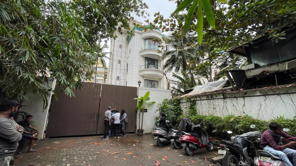 The officers brought along Kundra, who was arrested earlier this week, in pornographic films case The officers brought along Kundra, who was arrested earlier this week, in pornographic films case