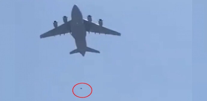 The two persons tied themselves to wheels of aircraft and fell. (Screengrab) The two persons tied themselves to wheels of aircraft and fell. (Screengrab)