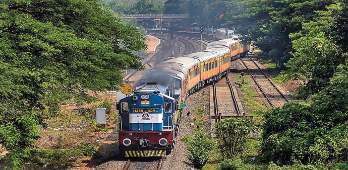 The Tejas Express luxury train leaves for its first return journey between Goa and Mumbai at the Karmali railway station in Goa The Tejas Express luxury train leaves for its first return journey between Goa and Mumbai at the Karmali railway station in Goa