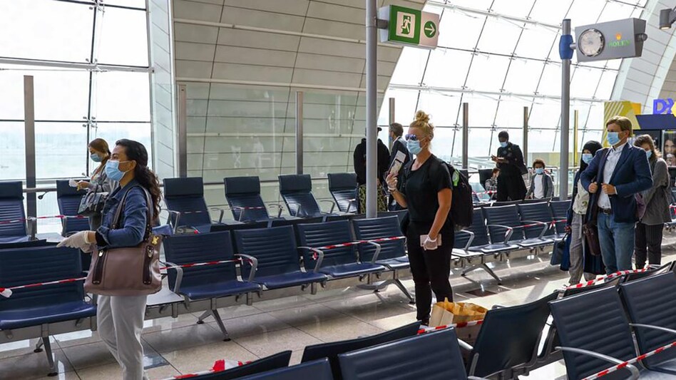 Passengers keep distance in a line at Dubai International Airport, as Emirates airline resumed limited outbound passenger flights amid the outbreak of the coronavirus disease (COVID-19) in Dubai, UAE April 27, 2020. (Photo: Reuters) Passengers keep distance in a line at Dubai International Airport, as Emirates airline resumed limited outbound passenger flights amid the outbreak of the coronavirus disease (COVID-19) in Dubai, UAE April 27, 2020. (Photo: Reuters)