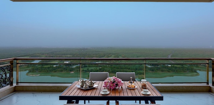 Grand vistas of the 200-acre golf course greet you from the balcony of every DLF Camellias apartment in Gurugram Grand vistas of the 200-acre golf course greet you from the balcony of every DLF Camellias apartment in Gurugram