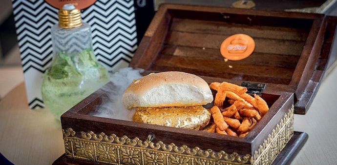 The vada is filled with Italian truffle butter and cheese, and is then wrapped in 22-carat edible gold from France The vada is filled with Italian truffle butter and cheese, and is then wrapped in 22-carat edible gold from France