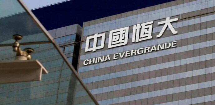 China Evergrande shares plunge on persistent pressure from debt travails China Evergrande shares plunge on persistent pressure from debt travails