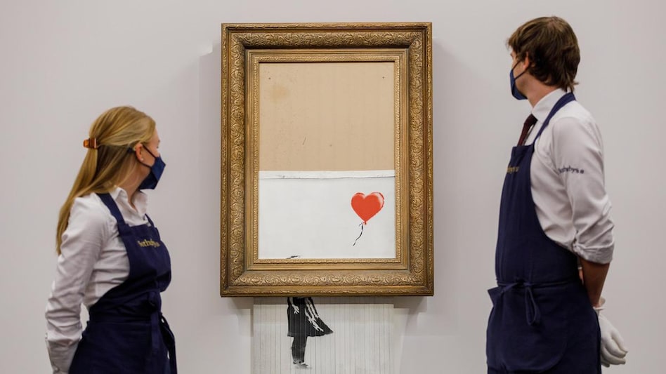 Banksy's infamous 'Love is in the Bin' is the first artwork in history to have been created live during an auction. Banksy's infamous 'Love is in the Bin' is the first artwork in history to have been created live during an auction.