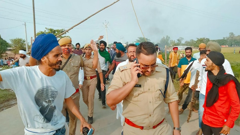 Farmer leaders had alleged that two SUVs ran over some protesters who were opposing Maurya's visit. Farmer leaders had alleged that two SUVs ran over some protesters who were opposing Maurya's visit.
