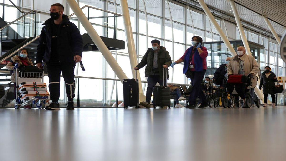 The cases were discovered among around 600 passengers who arrived at Amsterdam's Schiphol Airport on two flights on Friday. The cases were discovered among around 600 passengers who arrived at Amsterdam's Schiphol Airport on two flights on Friday.