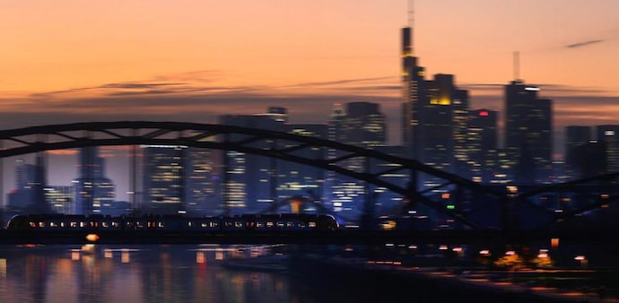 A commuter train passes by the skyline with its financial district ahead of the European Central Bank's governing council meeting later this week in Frankfurt, Germany. Photo: Reuters A commuter train passes by the skyline with its financial district ahead of the European Central Bank's governing council meeting later this week in Frankfurt, Germany. Photo: Reuters