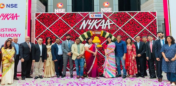 Nykaa’s market capitalisation (m-cap) breached the Rs 1 lakh crore mark for a while after the stellar listing on the bourses during its market debut today Nykaa’s market capitalisation (m-cap) breached the Rs 1 lakh crore mark for a while after the stellar listing on the bourses during its market debut today