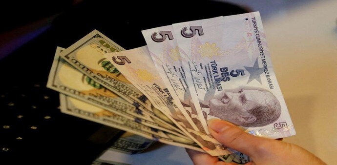 The lira hit a record low beyond 17 against the U.S. dollar on Friday. The lira hit a record low beyond 17 against the U.S. dollar on Friday.