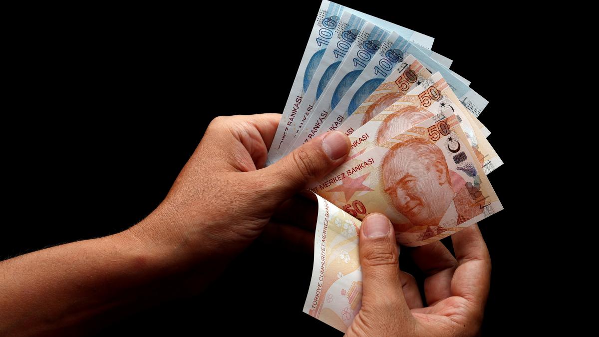 Turkish lira falls to a new low after Erdogan’s comments