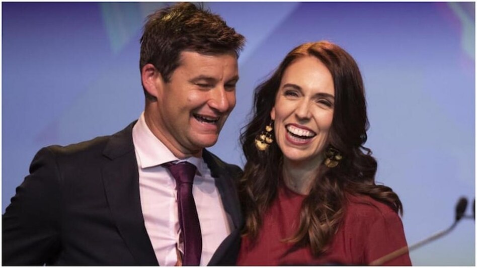 In this October 17, 2020, file photo, New Zealand Prime Minister Jacinda Ardern, right, is seen with her partner Clarke Gayford following her victory speech to Labour Party members at an event in Auckland, New Zealand. (AP Photo) In this October 17, 2020, file photo, New Zealand Prime Minister Jacinda Ardern, right, is seen with her partner Clarke Gayford following her victory speech to Labour Party members at an event in Auckland, New Zealand. (AP Photo)