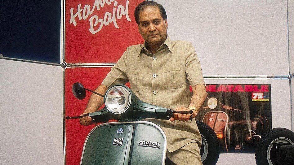 Rahul Bajaj in his younger days, in his trademark safari suit and with the iconic Bajaj Chetak scooter -- Photograph by Husain Fawzan Rahul Bajaj in his younger days, in his trademark safari suit and with the iconic Bajaj Chetak scooter -- Photograph by Husain Fawzan