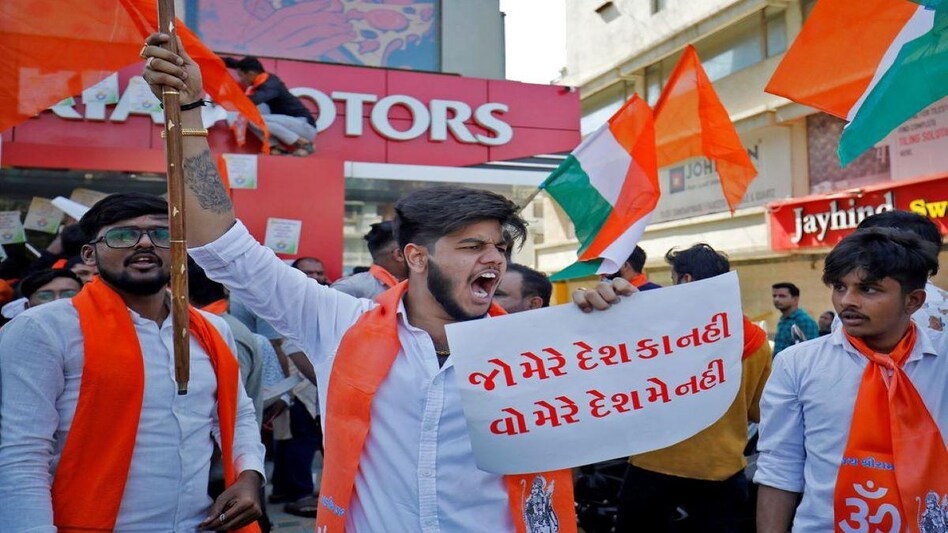 Shouting slogans, more than 100 members of Bajrang Dal also joined the protest. (Reuters) Shouting slogans, more than 100 members of Bajrang Dal also joined the protest. (Reuters)
