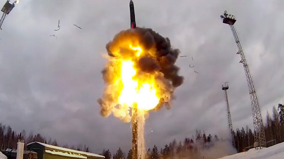 A Yars intercontinental ballistic missile being launched from an air field during military drills. A Yars intercontinental ballistic missile being launched from an air field during military drills.