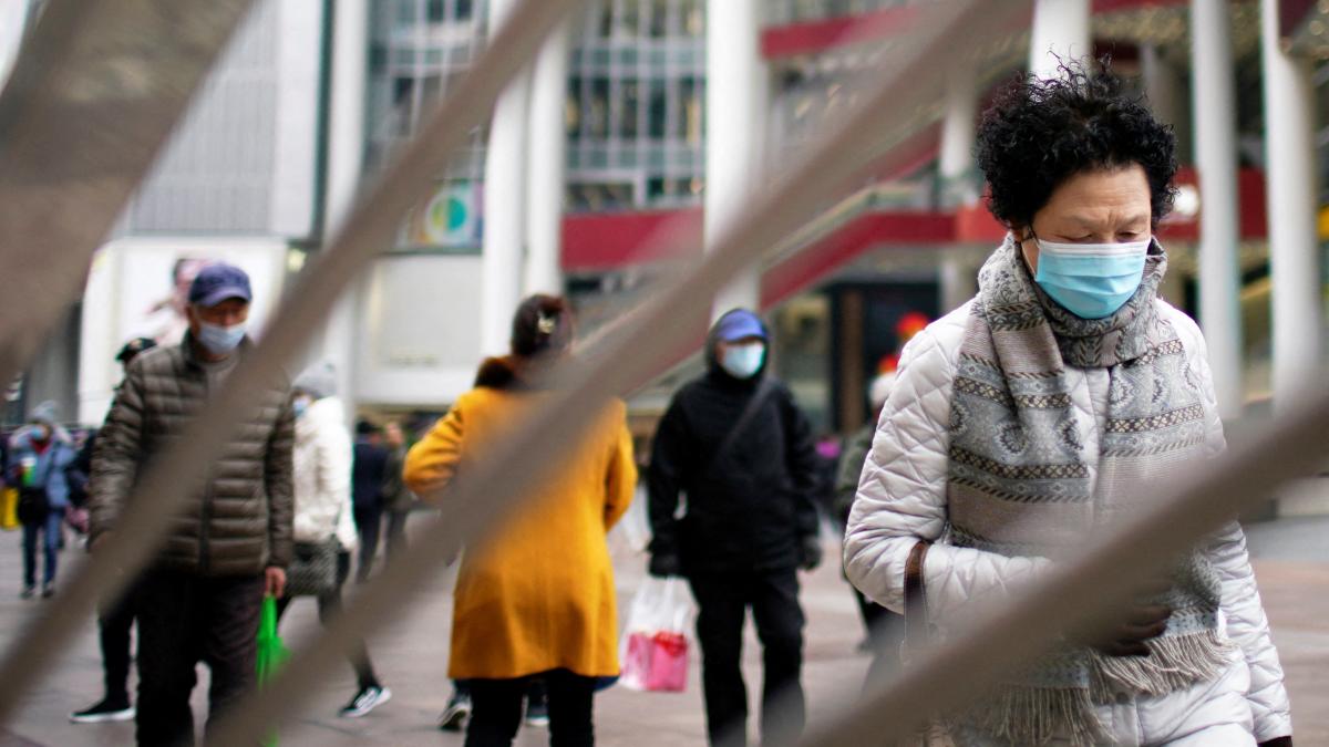 China's soaring COVID case load raises concerns about costs of containment 