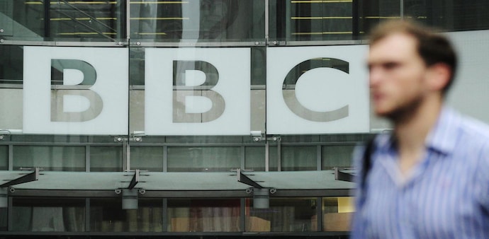 A pedestrian walks past a BBC logo at Broadcasting House in central London October (Photo: Reuters) A pedestrian walks past a BBC logo at Broadcasting House in central London October (Photo: Reuters)