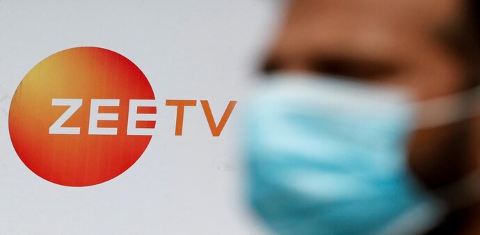 A guard stands next to a banner of Zee television outside a film studio in Mumbai. (Photo: Reuters) A guard stands next to a banner of Zee television outside a film studio in Mumbai. (Photo: Reuters)