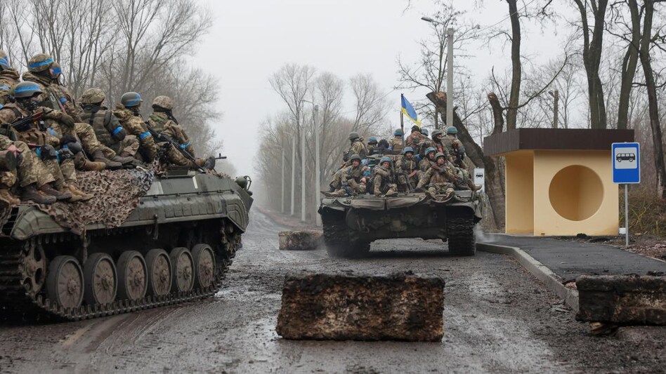 krainian service members ride atop armoured vehicles as Russia's attack on Ukraine continues. (Photo: Reuters) krainian service members ride atop armoured vehicles as Russia's attack on Ukraine continues. (Photo: Reuters)