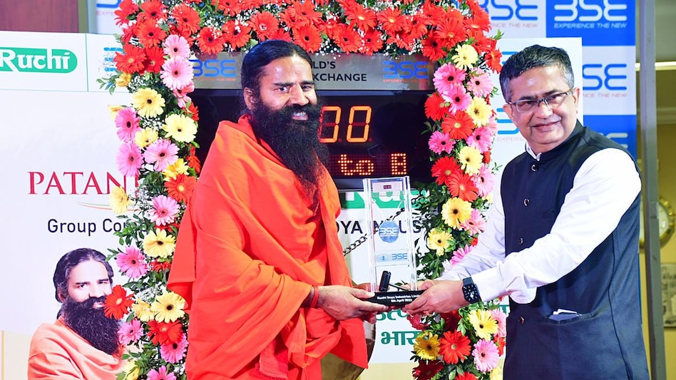Baba Ramdev at Ruchi Soya's FPO listing ceremony in BSE. Photo: ANI Baba Ramdev at Ruchi Soya's FPO listing ceremony in BSE. Photo: ANI