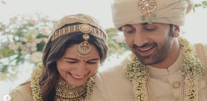 Alia and Ranbir matched the colour of their wedding outfits in ivory, styled by Bollywood's go-to wedding designer Sabyasachi Mukherjee. Alia and Ranbir matched the colour of their wedding outfits in ivory, styled by Bollywood's go-to wedding designer Sabyasachi Mukherjee.