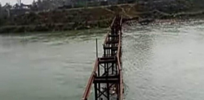 A group of men, posing as officers of the Irrigation Department, dismantled the defunct bridge with the help of gas-cutters and earthmovers over three days, police said. A group of men, posing as officers of the Irrigation Department, dismantled the defunct bridge with the help of gas-cutters and earthmovers over three days, police said.