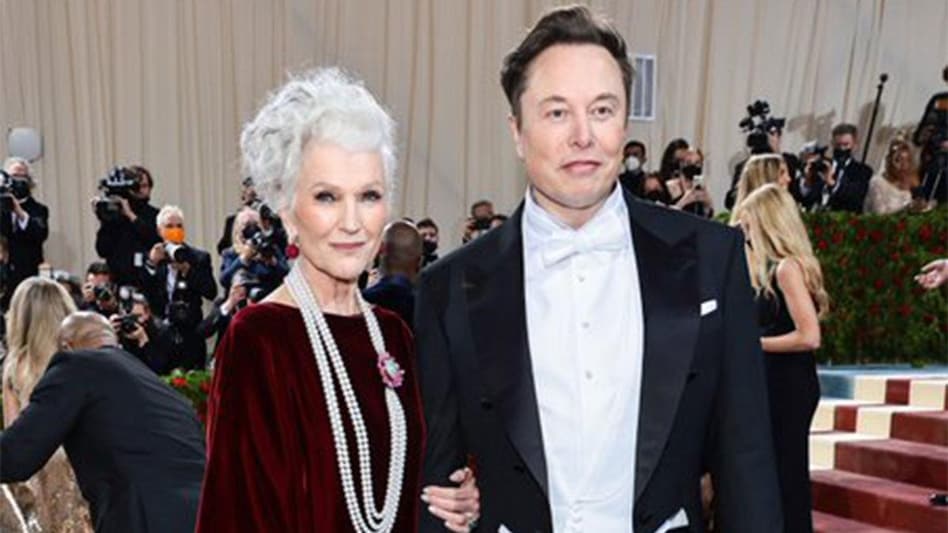 He was dressed in a black tuxedo whereas Maye donned a long-sleeved red velvet dress for the event. (Image: Twitter) He was dressed in a black tuxedo whereas Maye donned a long-sleeved red velvet dress for the event. (Image: Twitter)