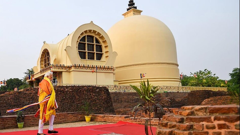 Prime Minister Narendra Modi during his visit to offer prayers at the Mahaparinirvana Stupa, in Kushinagar. Prime Minister Narendra Modi during his visit to offer prayers at the Mahaparinirvana Stupa, in Kushinagar.