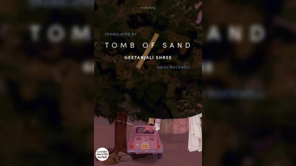'Tomb of Sand', originally 'Ret Samadhi', is set in northern India and follows an 80-year-old woman in a tale the Booker judges dubbed a joyous cacophony and an "irresistible novel". 'Tomb of Sand', originally 'Ret Samadhi', is set in northern India and follows an 80-year-old woman in a tale the Booker judges dubbed a joyous cacophony and an "irresistible novel".